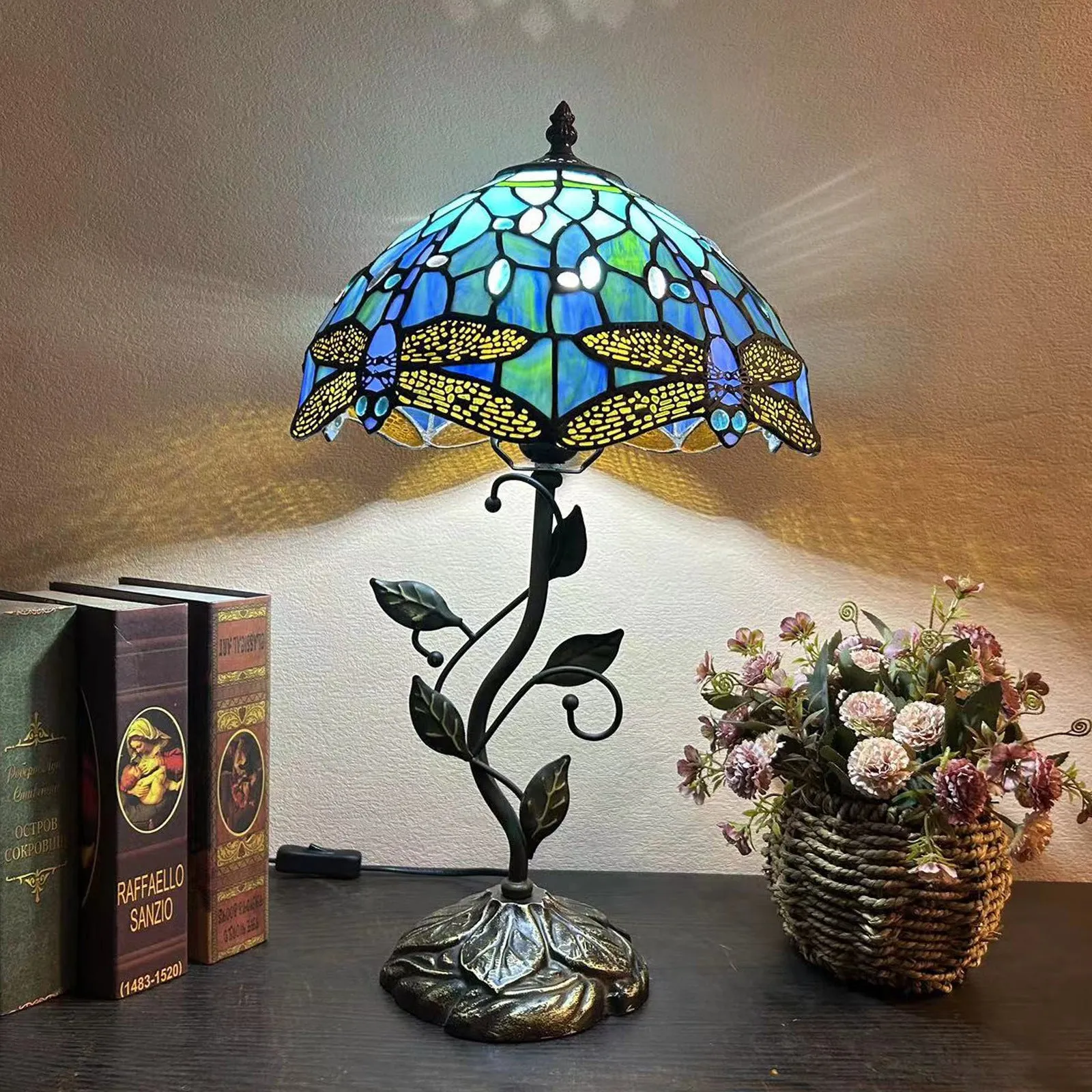 American Pastoral Tiffany 12-inch table lamp with coloured glass shade and resin base, 30 cm wide