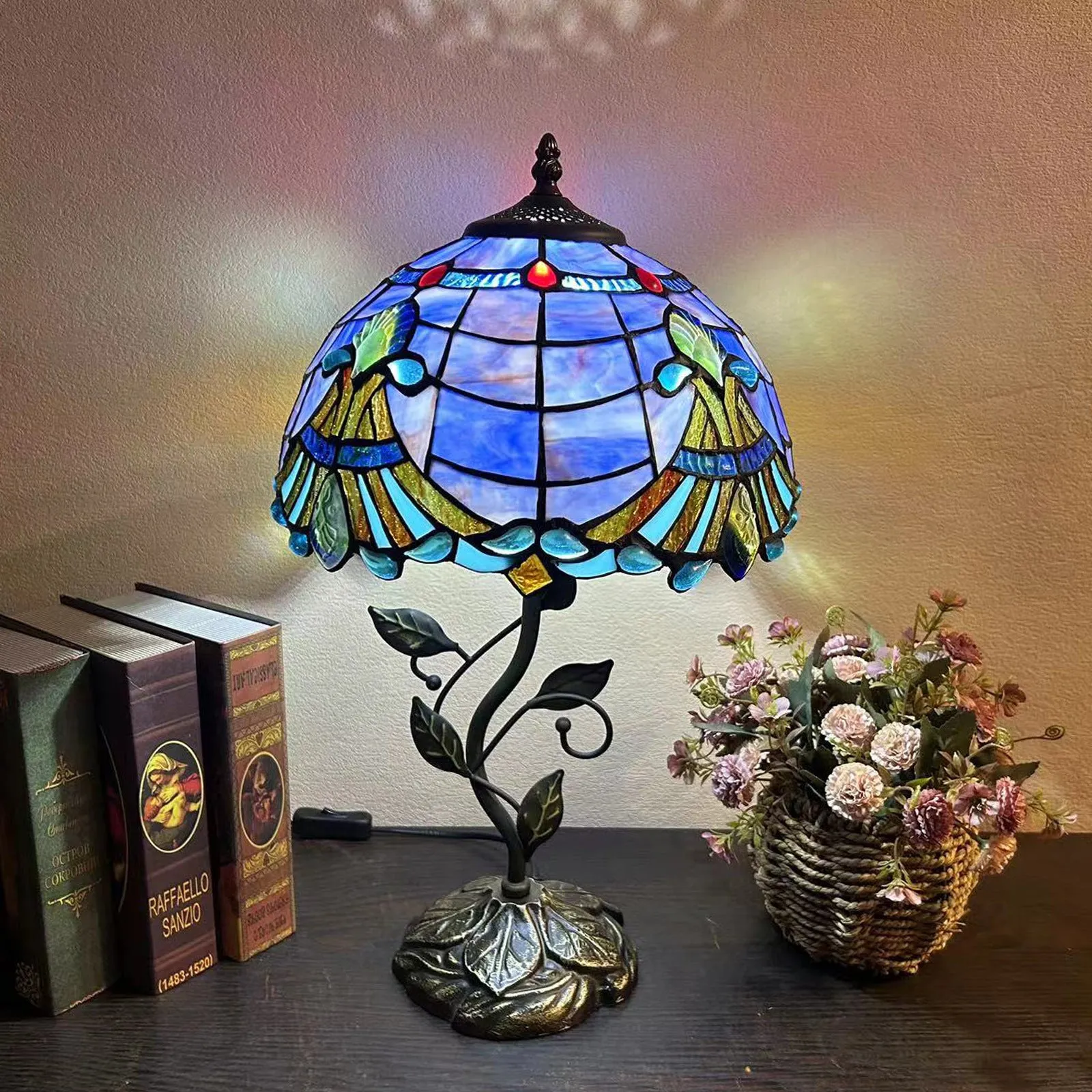 American Pastoral Tiffany 12-inch table lamp with coloured glass shade and resin base, 30 cm wide