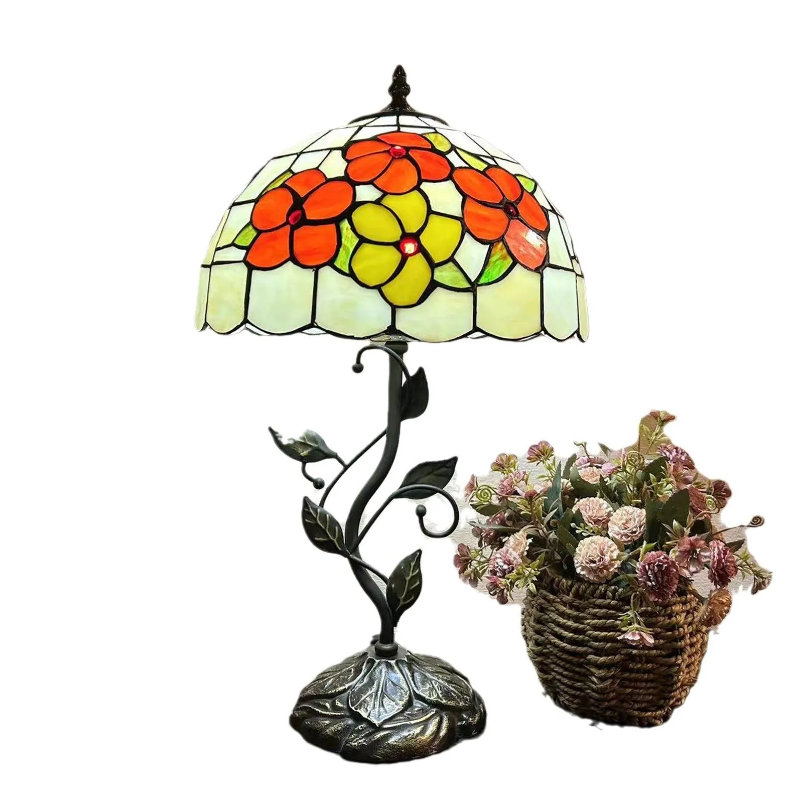 American Pastoral Tiffany 12-inch table lamp with coloured glass shade and resin base, 30 cm wide