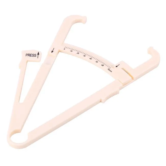 Compact acrylic fat caliper for body fat measurement, showing size and scale.
