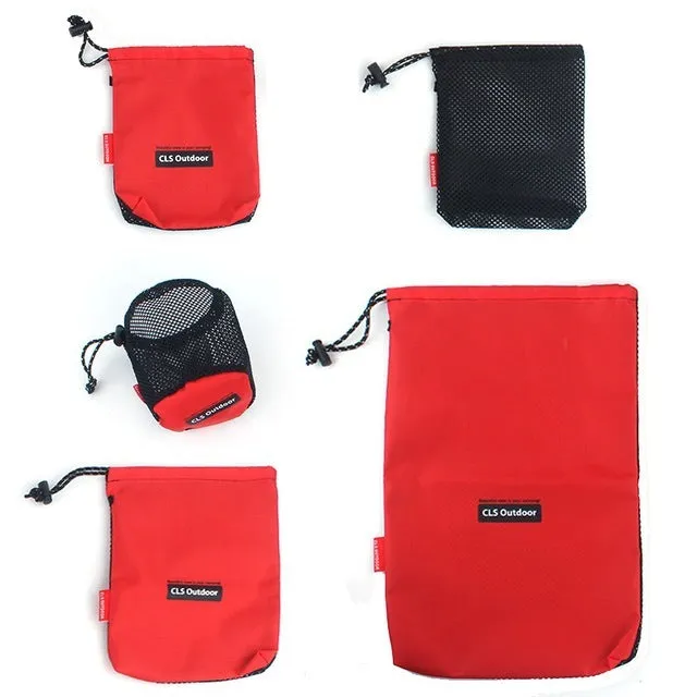 Set of five red Oxford cloth travel storage bags with zippers and mesh panels