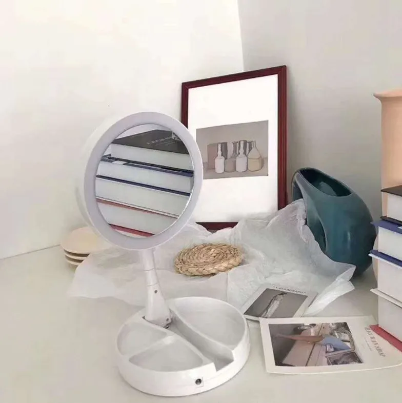 White foldable acrylic vanity mirror with LED lights and USB charging port