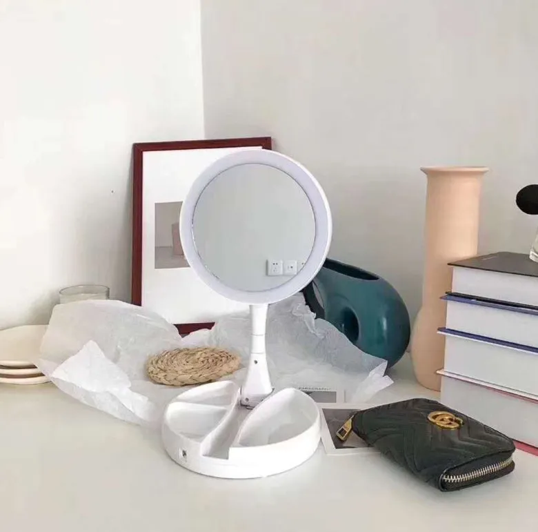 White foldable acrylic vanity mirror with LED lights and USB charging port