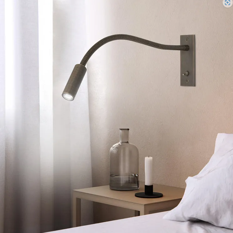 Embedded aluminium wall lamp in sand nickel finish for bedside use with warm LED light