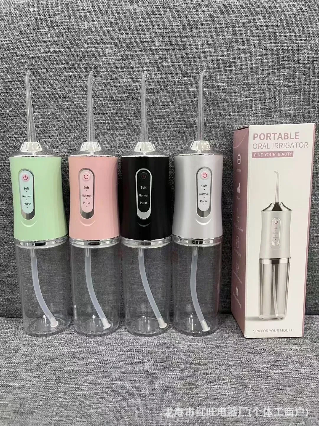 Pink electric water flosser with 300ml tank, multiple nozzles, and IPX7 waterproof design
