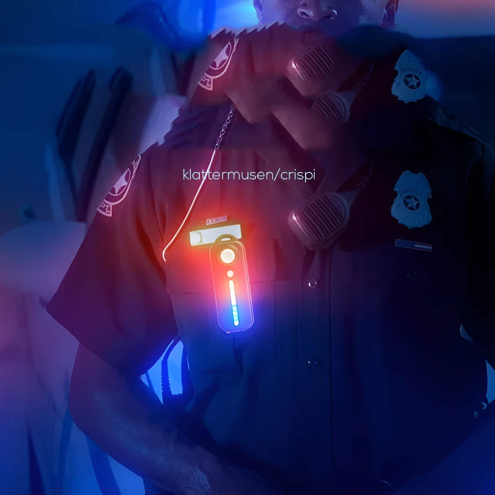 Black bicycle warning taillight with clip and strap on a backpack strap, showing red and blue flash mode