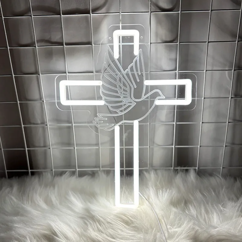 Acrylic LED neon light plate with peace dove cross design emitting white light on a dark background