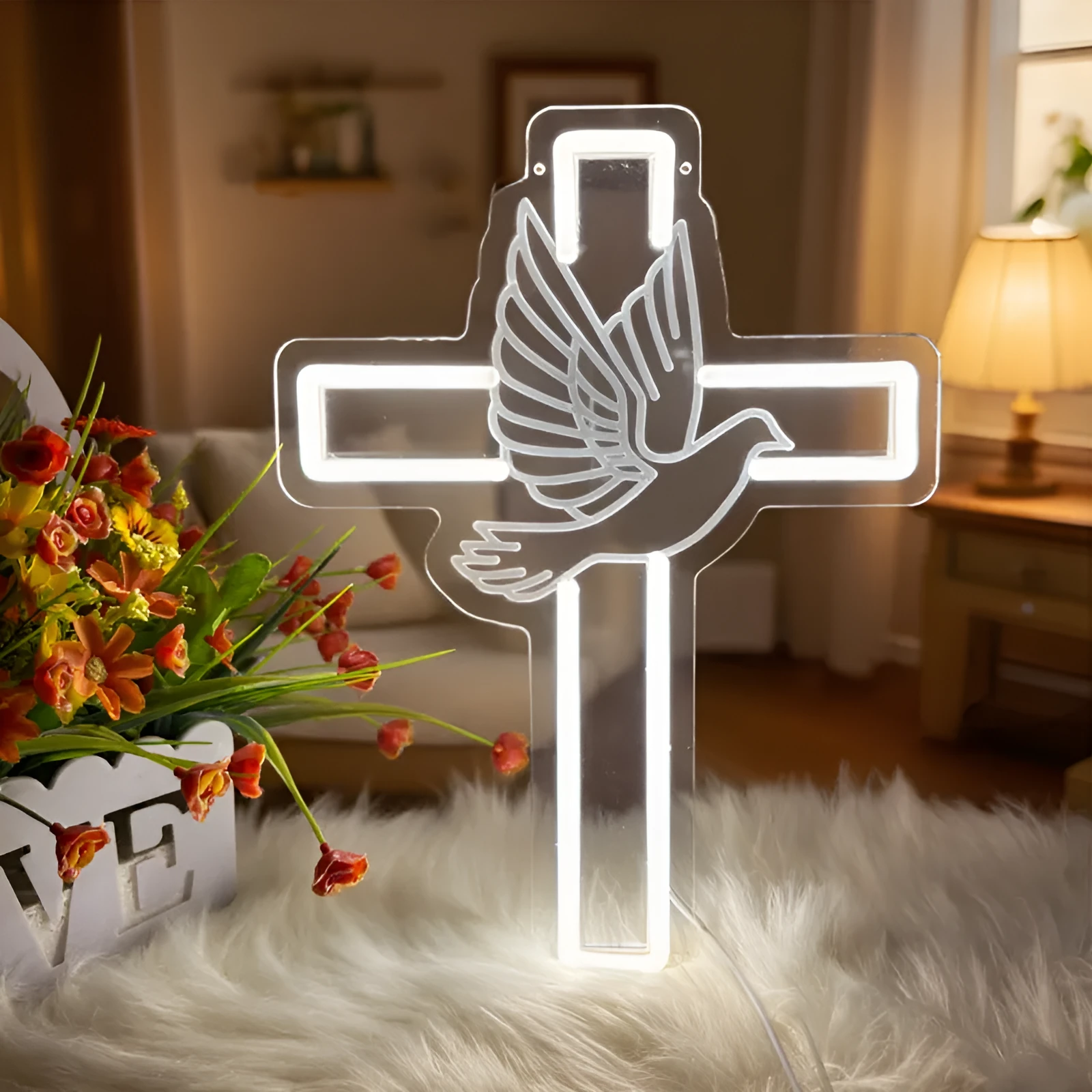 Acrylic LED neon light plate with peace dove cross design emitting white light on a dark background