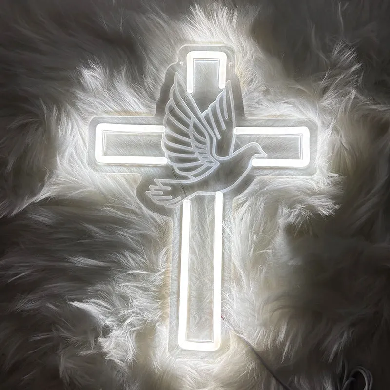 Acrylic LED neon light plate with peace dove cross design emitting white light on a dark background