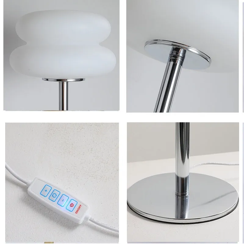 Desktop small table lamp with glass lampshade and USB plug-in tri-colour lighting on a wooden desk