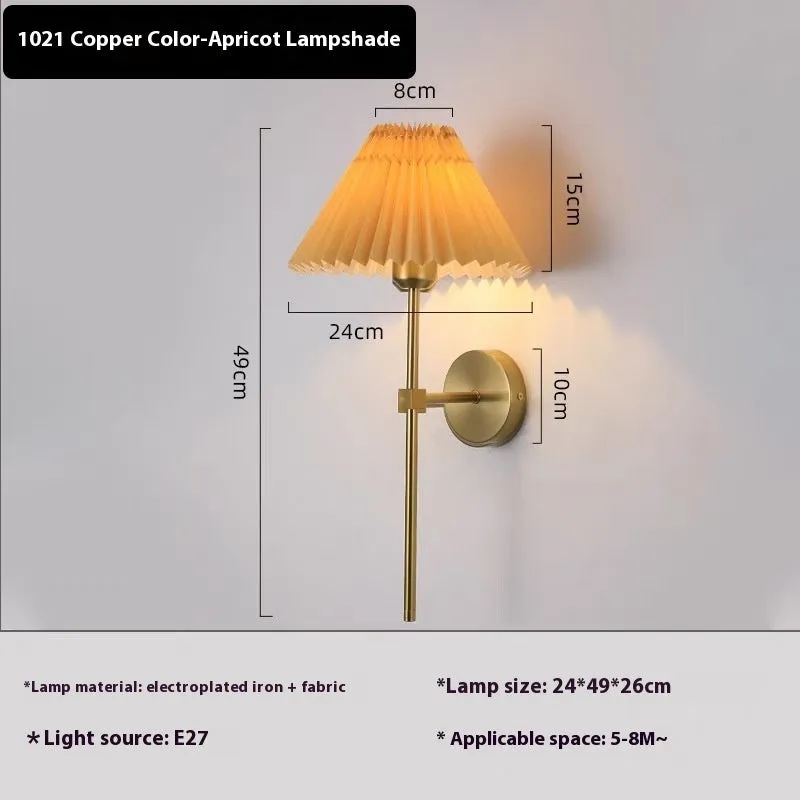 Retro LED wall lamp in iron finish with apricot colour option for bedside reading