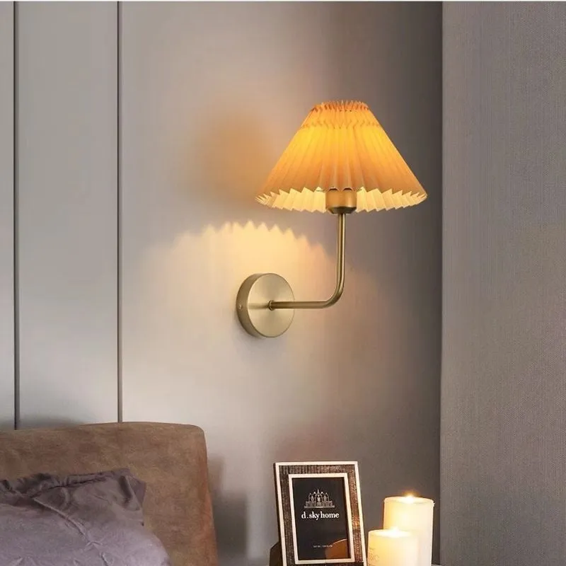 Retro LED wall lamp in iron finish with apricot colour option for bedside reading