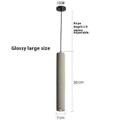 Cement industrial droplight in glossy finish on a wooden bedside table
