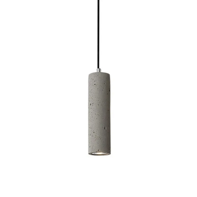 Cement industrial droplight in glossy finish on a wooden bedside table