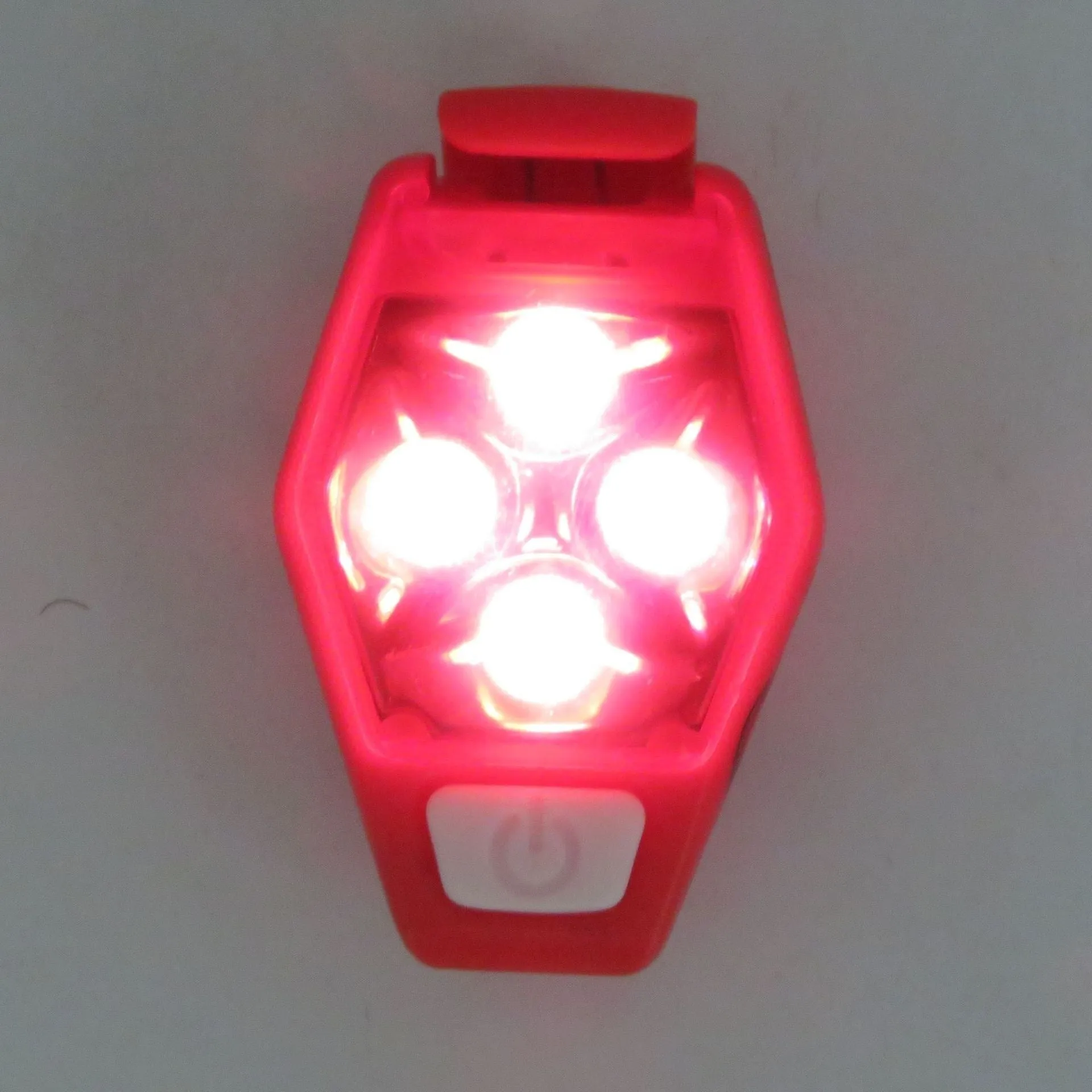 Multi-colour LED diamond night running clip lamp with seven colour options shown on black background