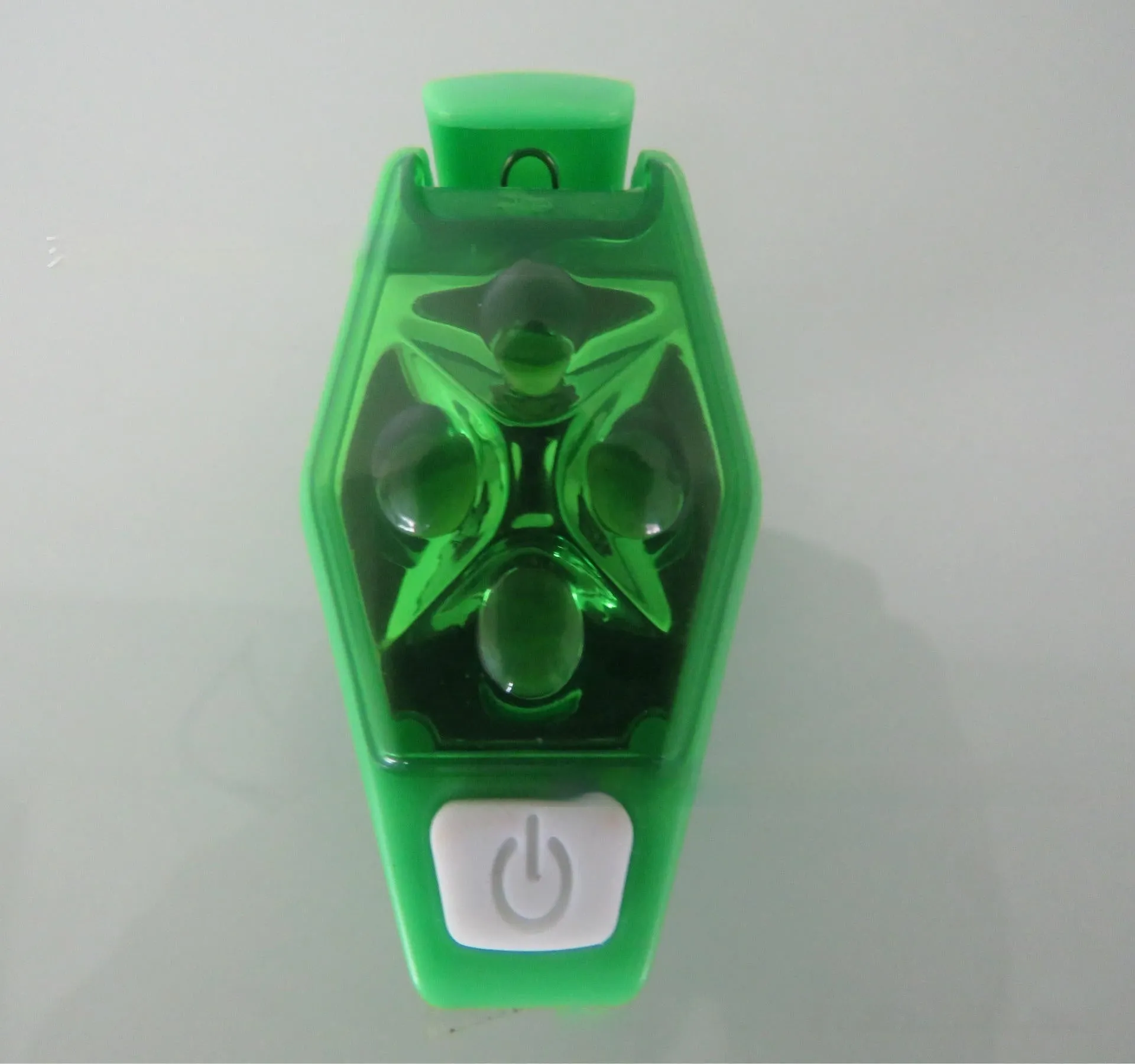 Multi-colour LED diamond night running clip lamp with seven colour options shown on black background