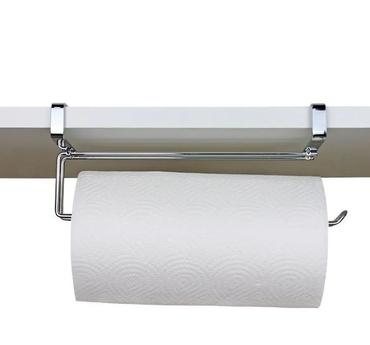 Silver stainless steel paper towel rack hanging on a kitchen cabinet door.