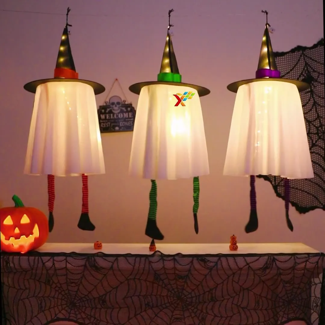 White Halloween wizard hat and ghost LED light string pendant hung indoors