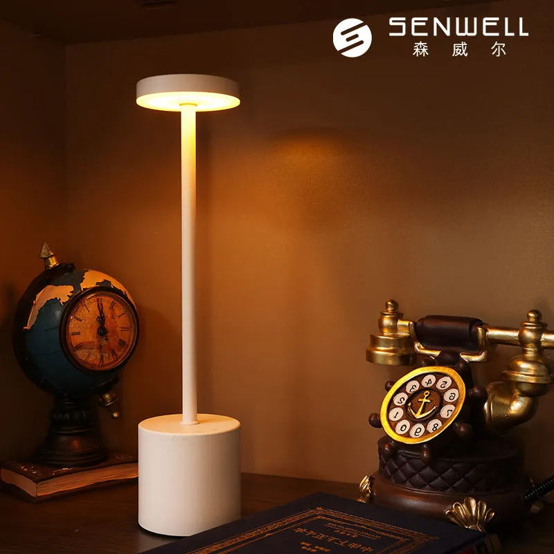 Modern minimalist table lamp with iron I-shaped frame and silver finish, LED ambient light for bedroom or bar