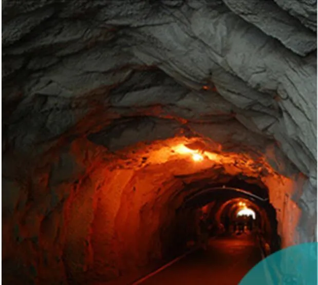 Aluminium alloy rechargeable LED headlamp with adjustable elastic headband shown in use.