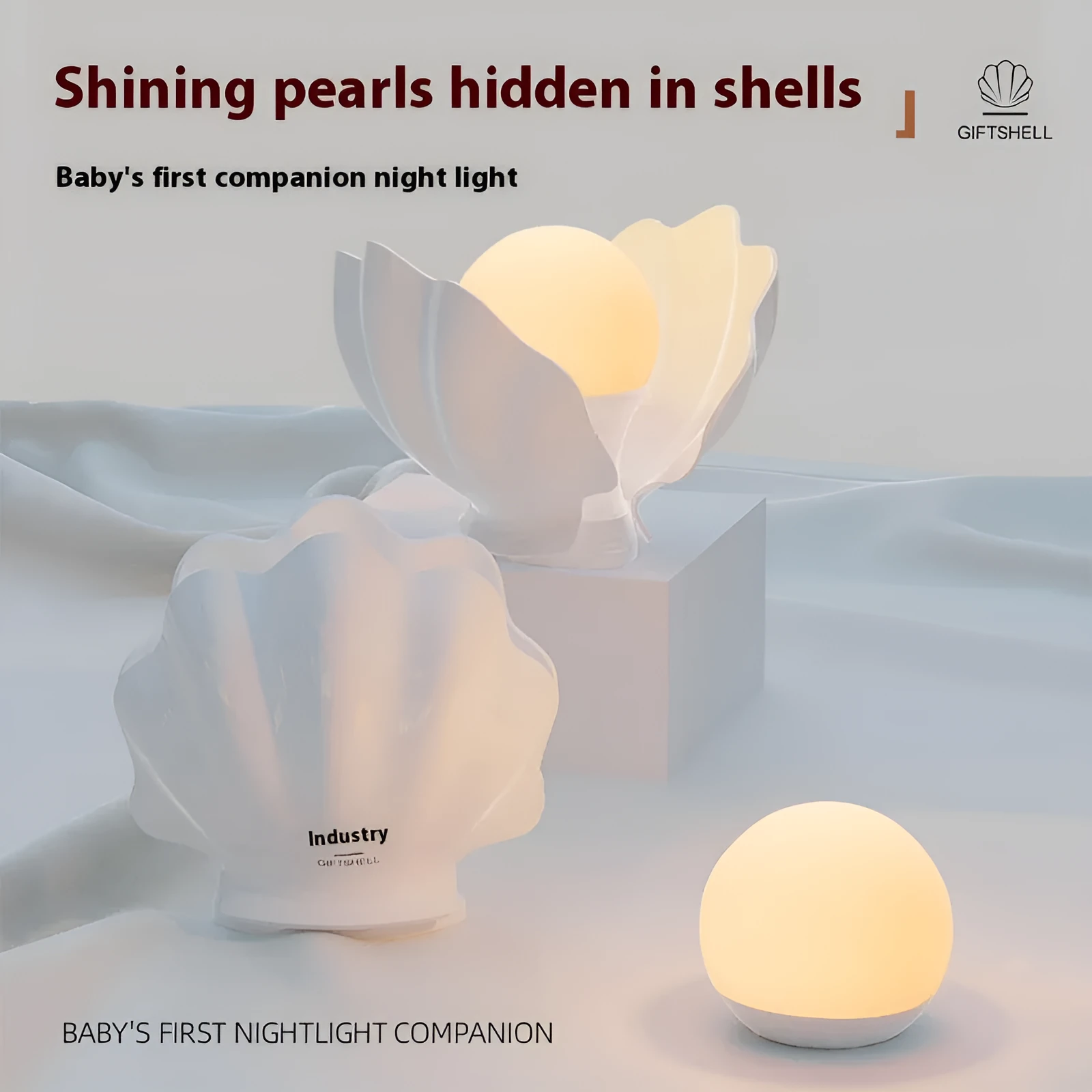 Shell pearl coloured silicone pat induction night light with power storage, disk shape 140x145x160 mm