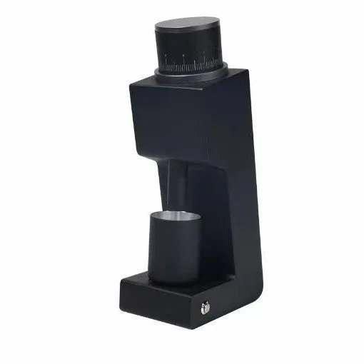 Electric coffee grinder with inclined aluminium alloy body in white on a countertop for home or office use
