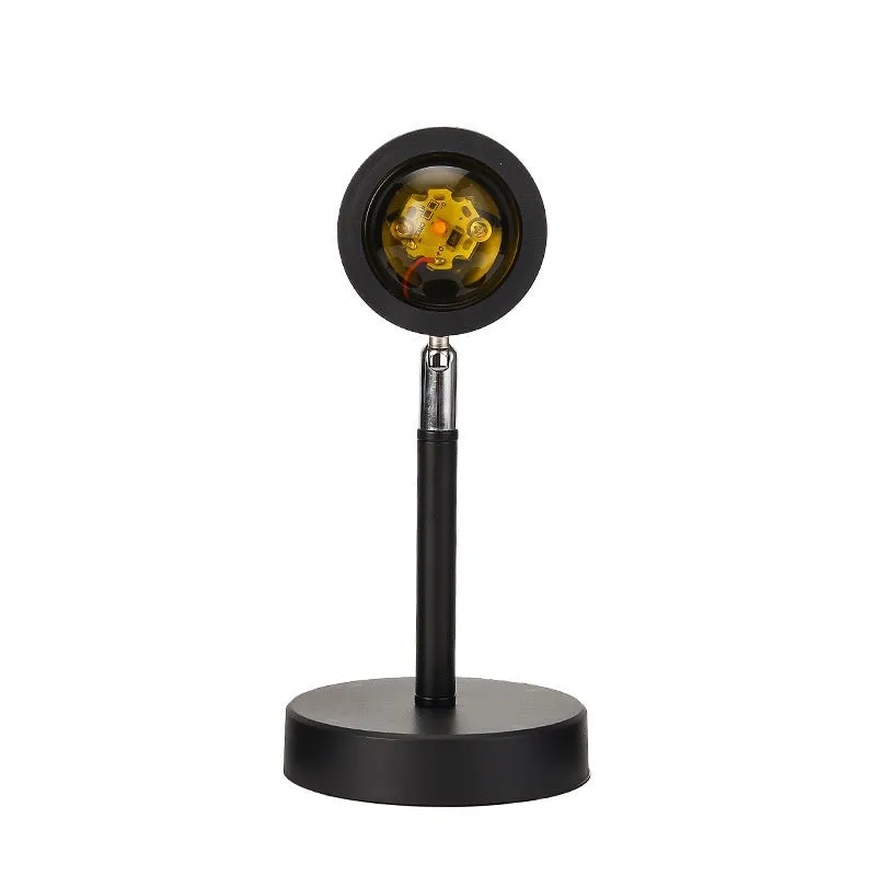 Sunset red USB floor lamp in modern simplicity style, 12.5 x 27 cm, with RGB colour options on a desk.
