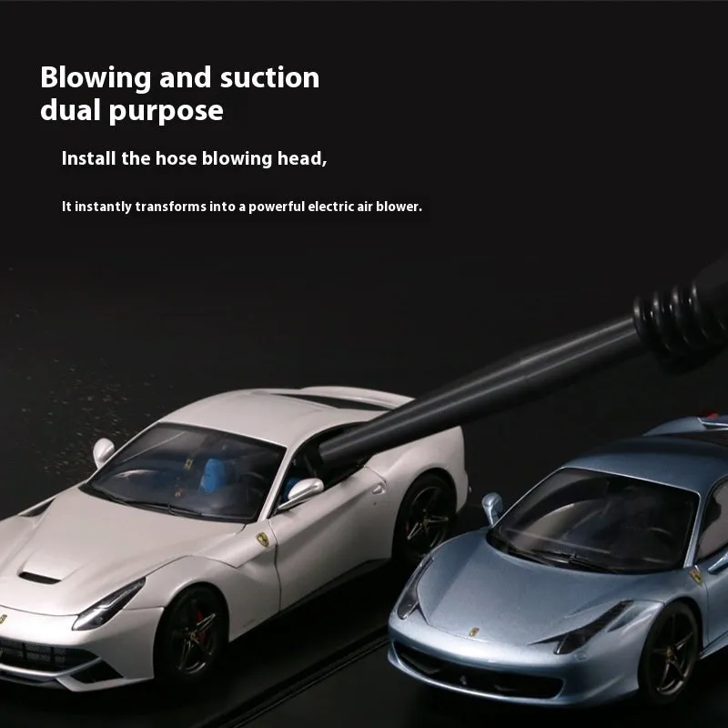 Portable handheld vacuum cleaner with nozzle for car interior and desktop dust removal, metal and plastic build