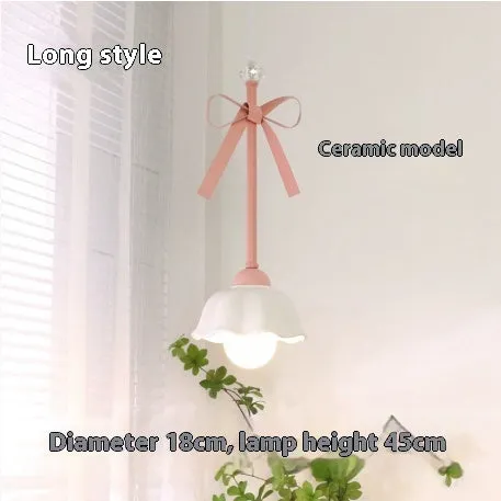 Bow-shaped small pendant lamp in cream style with crown finish, suitable for dining room or bedroom ceiling installation