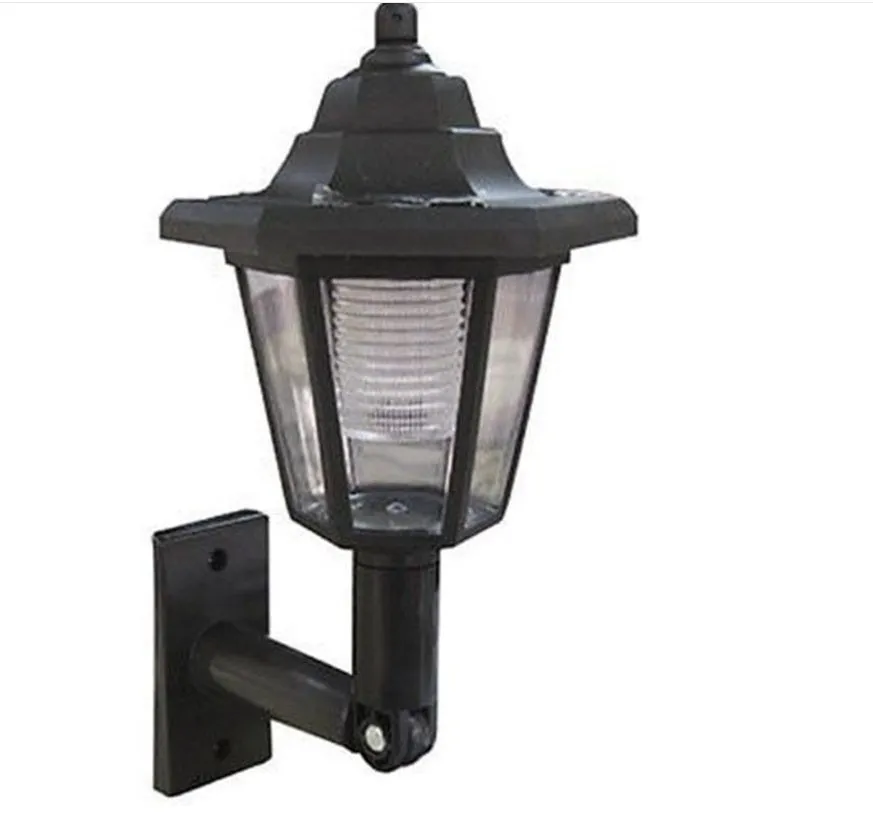 Black hexagonal solar-powered wall light with LED and solar panel for outdoor use