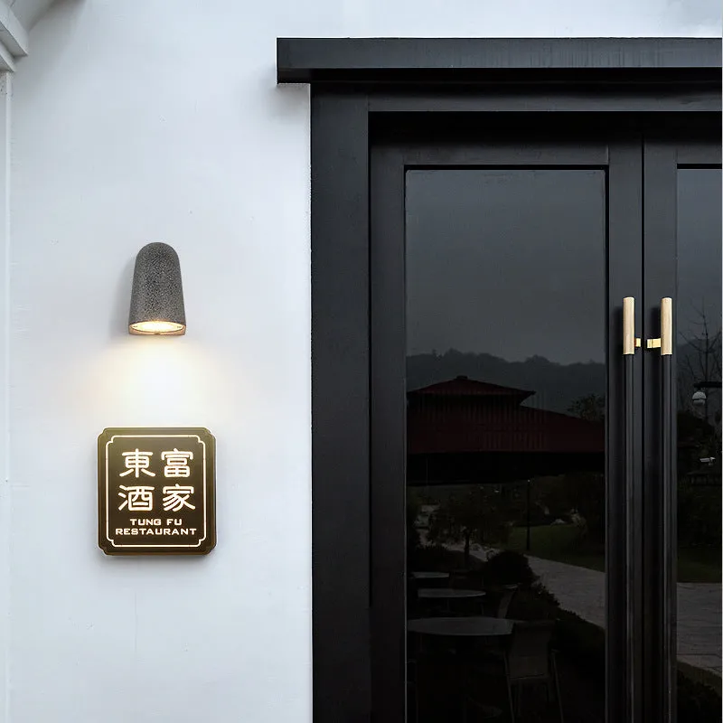 Cement outdoor wall lamp with decorative horseshoe shape, black sandstone finish, IP65 waterproof, with warm light