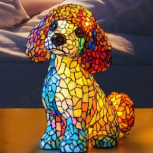 Colourful resin dog lamp decoration in pug shape, button battery powered, on a shelf