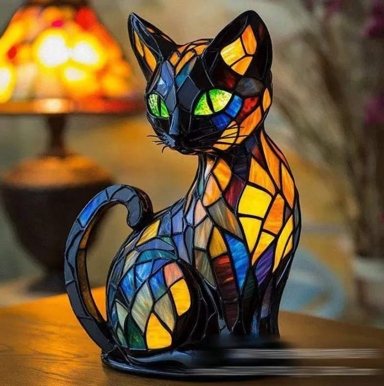 Colourful resin dog lamp decoration in pug shape, button battery powered, on a shelf