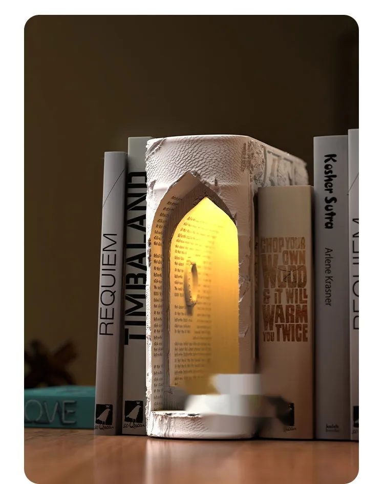 Magic book gypsum table lamp with switch control on a bedside table