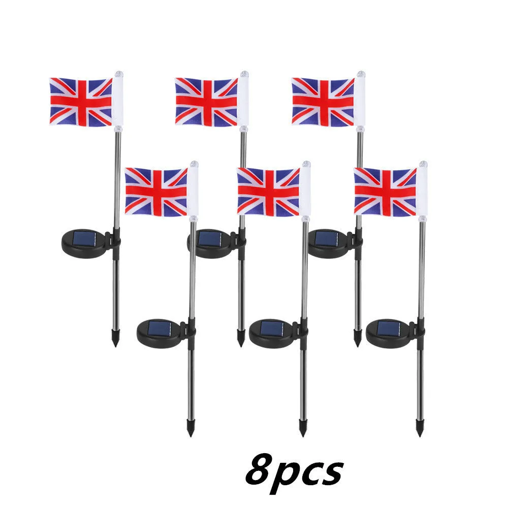 Solar-powered stainless steel garden flag light showing American flag design with white LEDs illuminated.