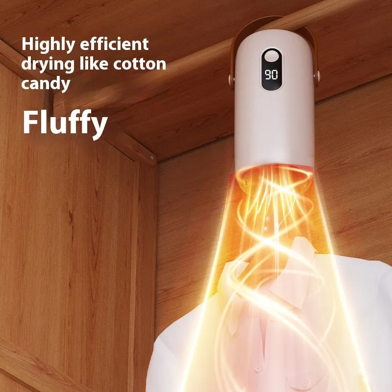 White portable household small cubic dryer with PTC heating on plain surface