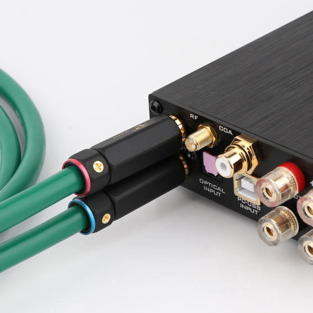Silver-plated 4-core shielded audio interconnect cable with Lotus RCA plugs on a black background.
