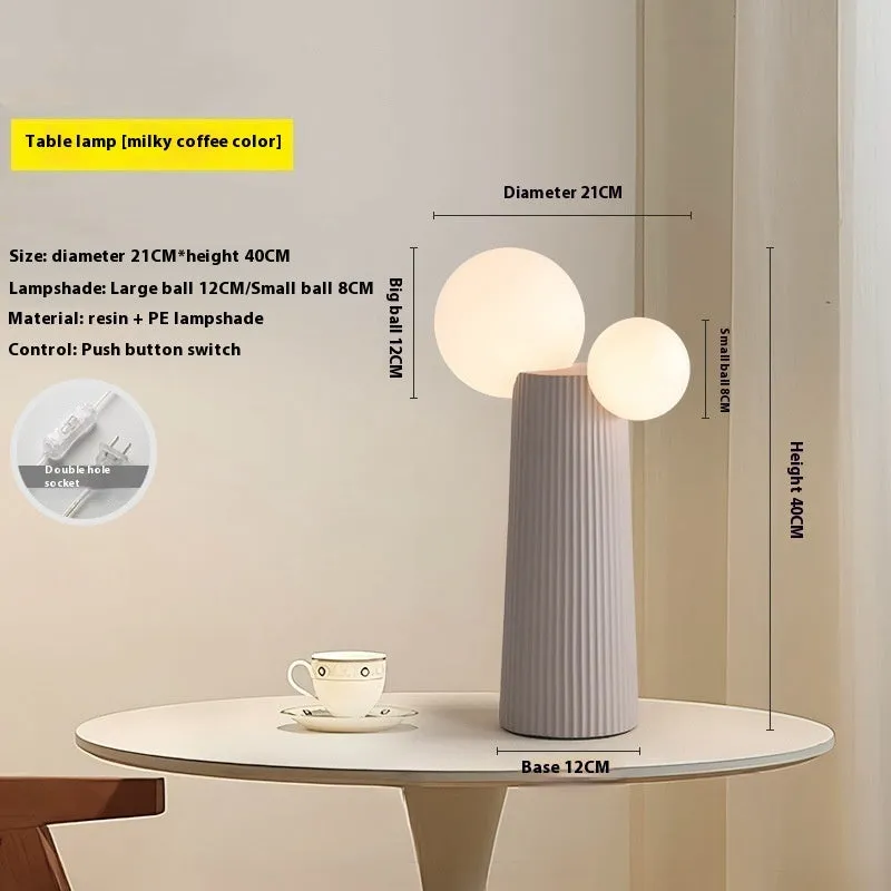 Modern minimalist cactus bedside lamp in milk coffee colour, resin and PE lampshade, 21cm diameter 40cm height, on bedside table