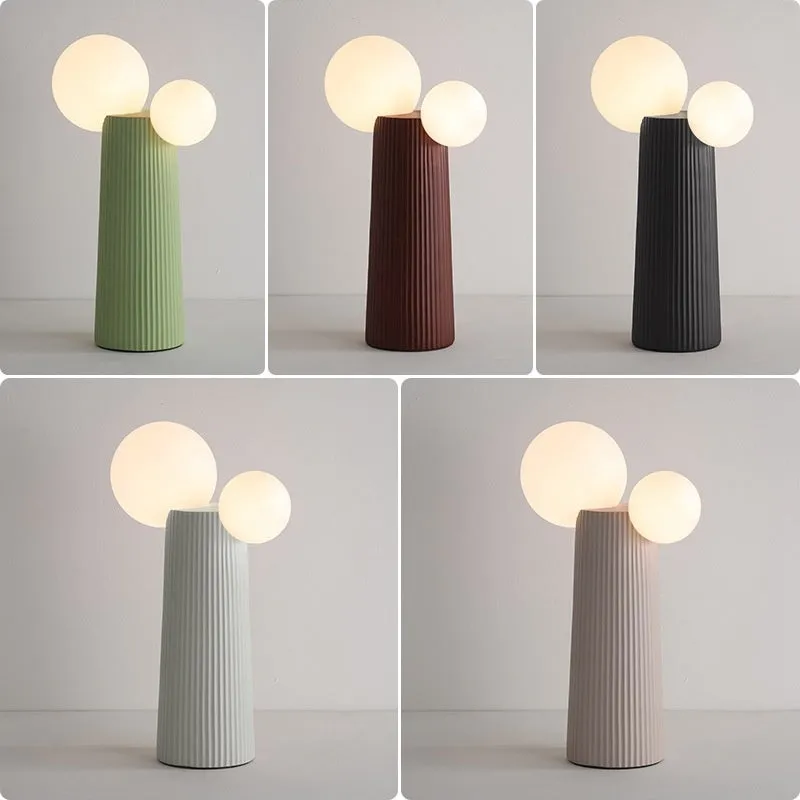 Modern minimalist cactus bedside lamp in milk coffee colour, resin and PE lampshade, 21cm diameter 40cm height, on bedside table
