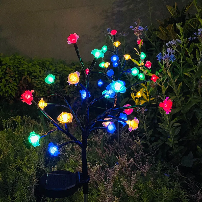 Outdoor solar LED garden ground lamp in flower shape with PVC shell and IP65 protection