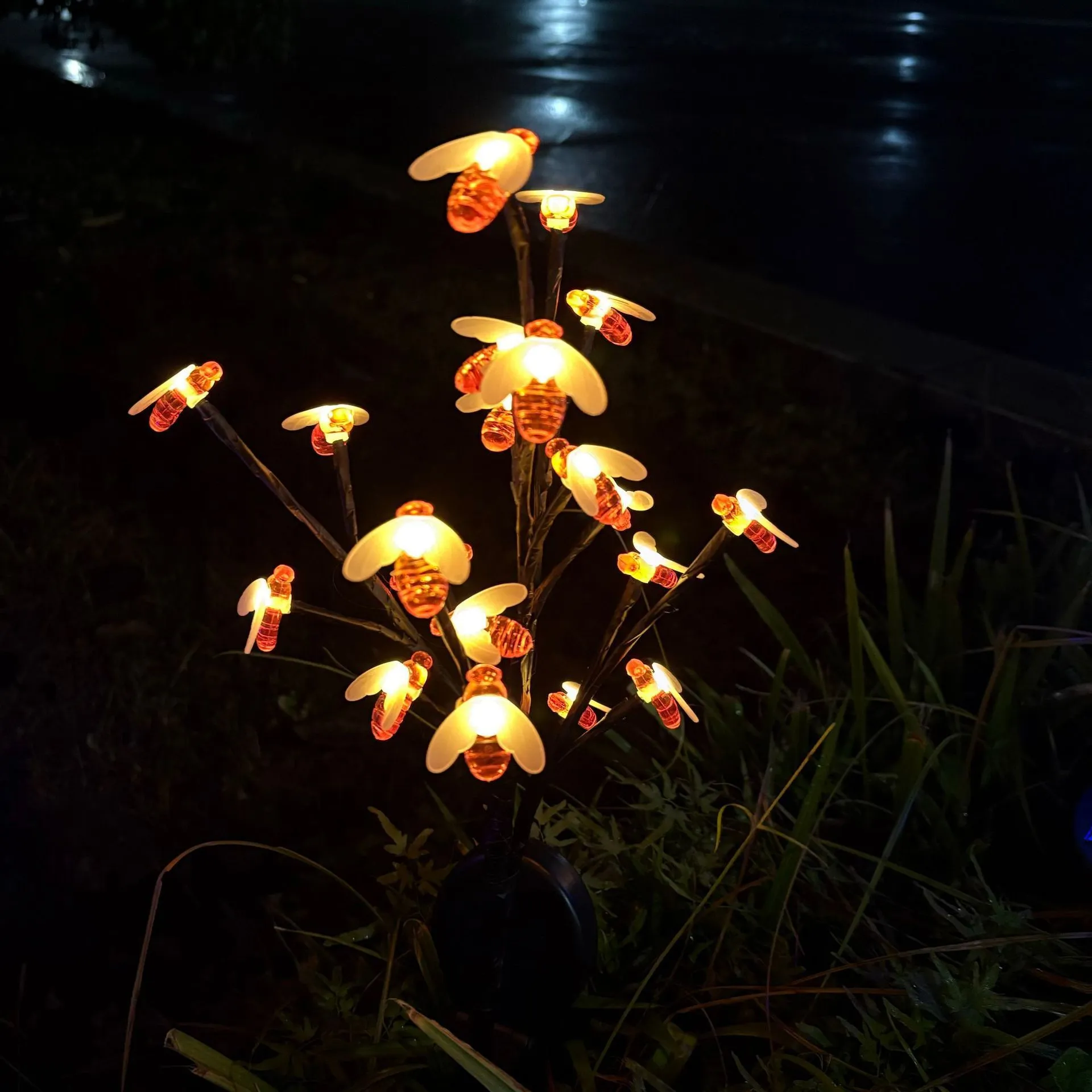 Outdoor solar LED garden ground lamp in flower shape with PVC shell and IP65 protection