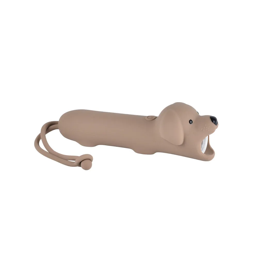 Four silicone animal toy flashlights in Blue Shark, Brown Lion, Brown Puppy, and Green Crocodile designs