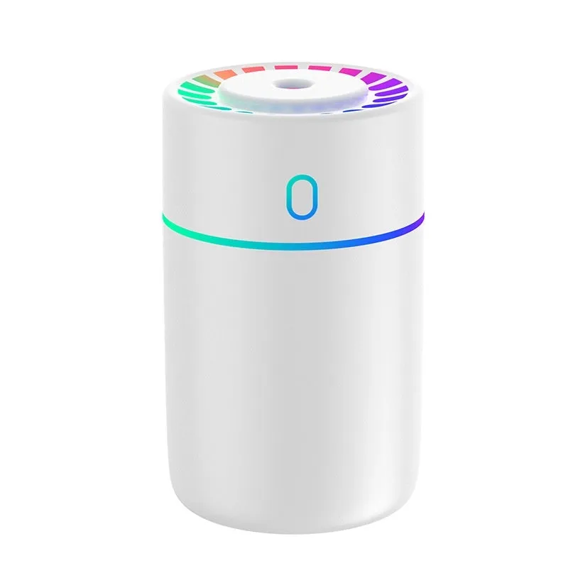 Round plastic USB desktop humidifier in black, pink, and white with single fog outlet