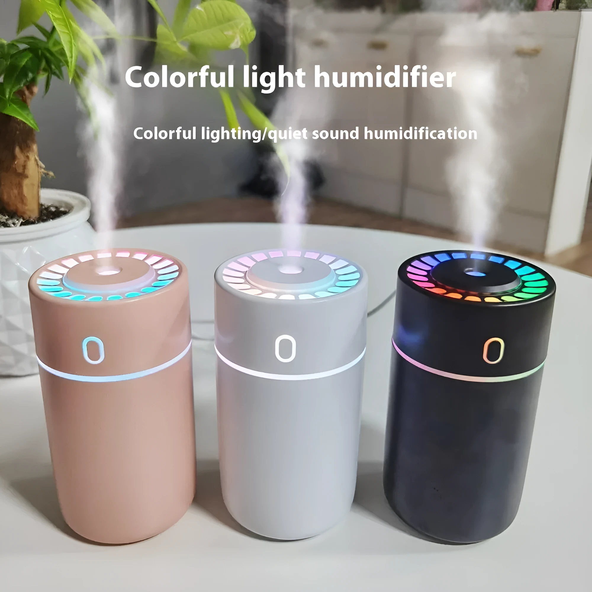 Round plastic USB desktop humidifier in black, pink, and white with single fog outlet