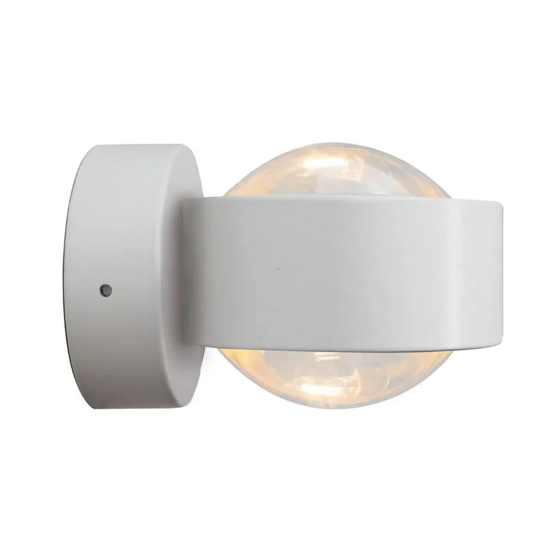 Modern small wall lamp in chrome finish for bedside or hallway lighting
