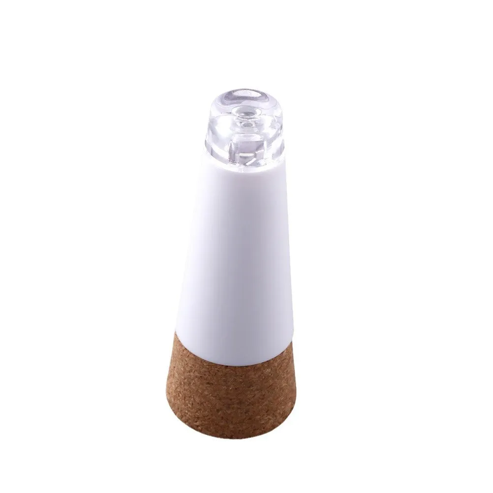A plastic rechargeable LED bottle cap light for holiday decoration, measuring 30mm wide.