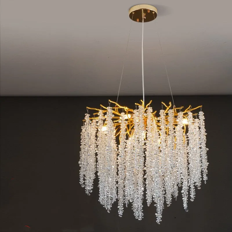 Modern crystal and aluminium alloy LED chandelier light fixture with adjustable height.