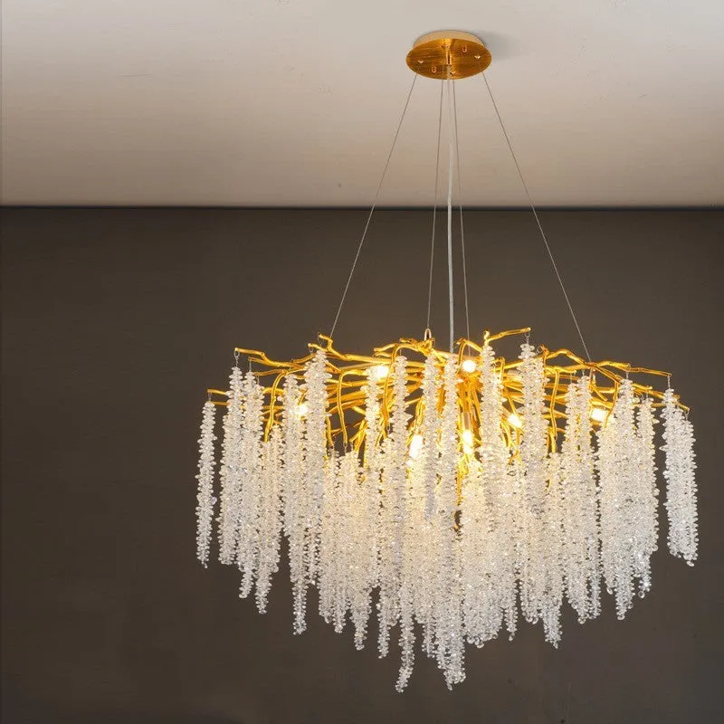Modern crystal and aluminium alloy LED chandelier light fixture with adjustable height.