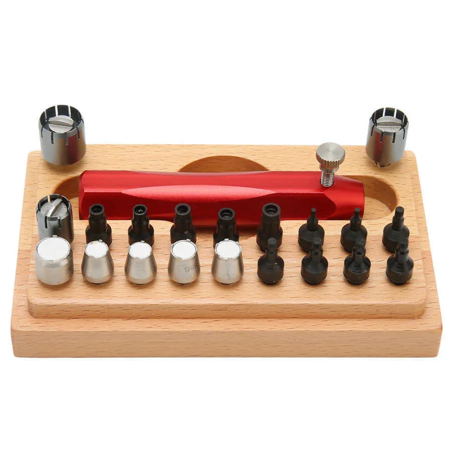 20-piece steel watch repair barrel-opening tool set on a workbench