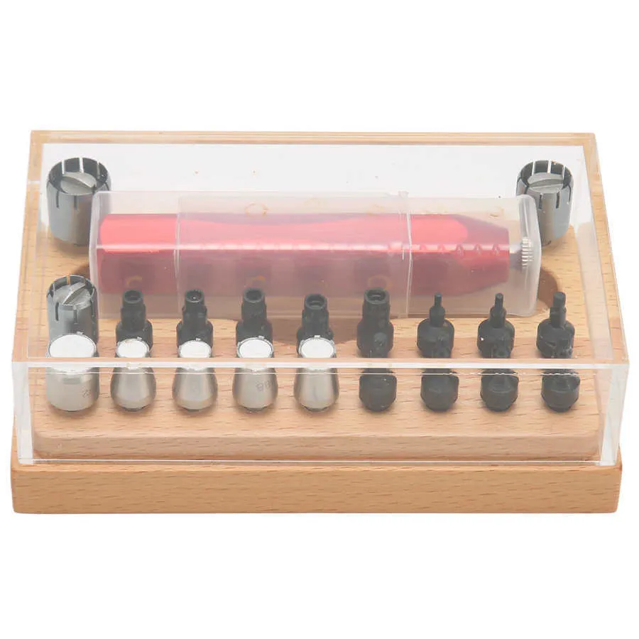 20-piece steel watch repair barrel-opening tool set on a workbench